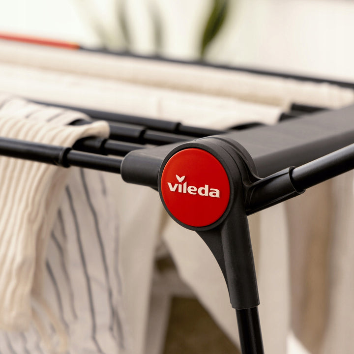 Tendedero Vileda Infinity Flex Ultimate, color negro, hasta 30 m de superficie de secado, extensible, estructura elevada, ganchos para la ropa, ruedas integradas, 179620