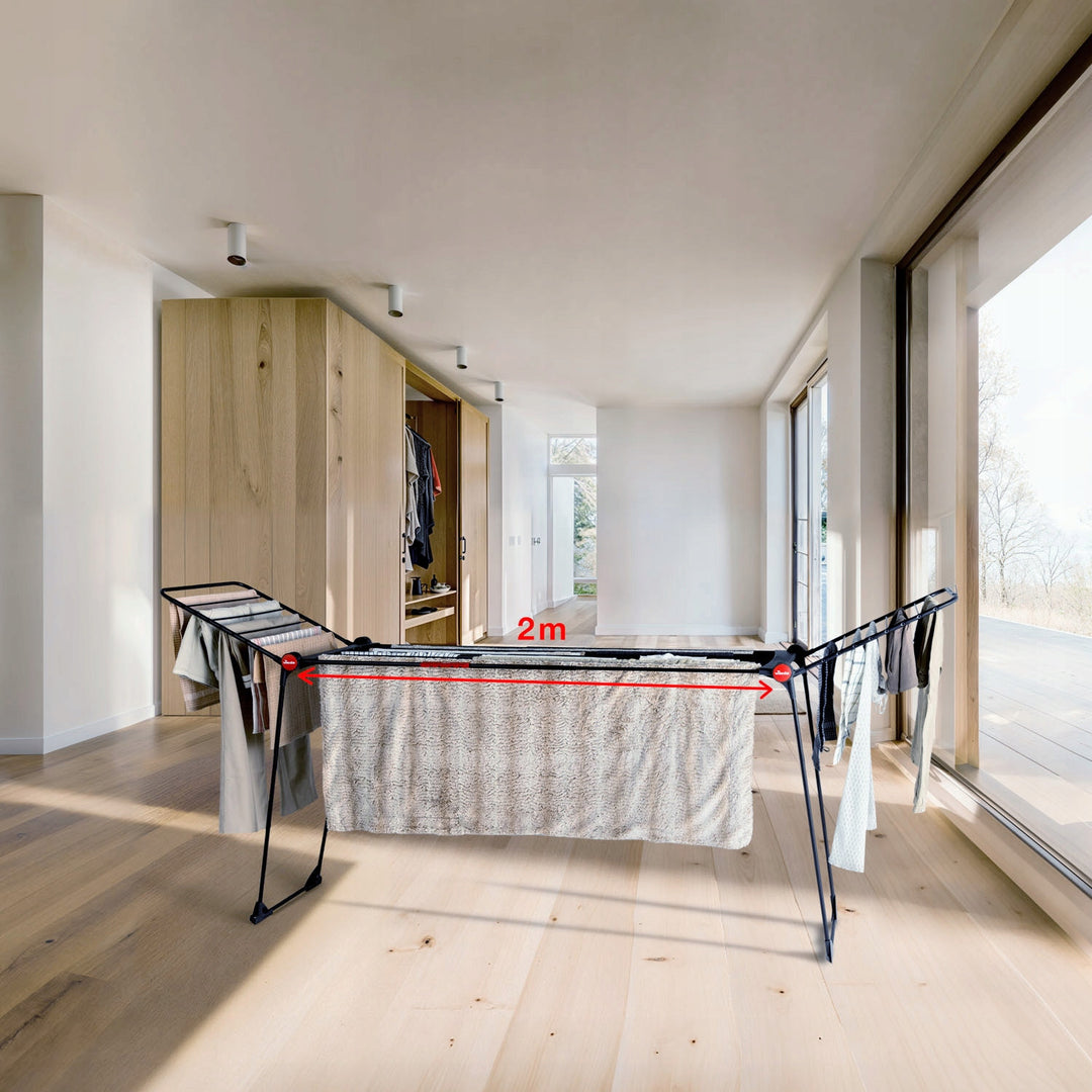 Tendedero Vileda Infinity Flex Ultimate, color negro, hasta 30 m de superficie de secado, extensible, estructura elevada, ganchos para la ropa, ruedas integradas, 179620